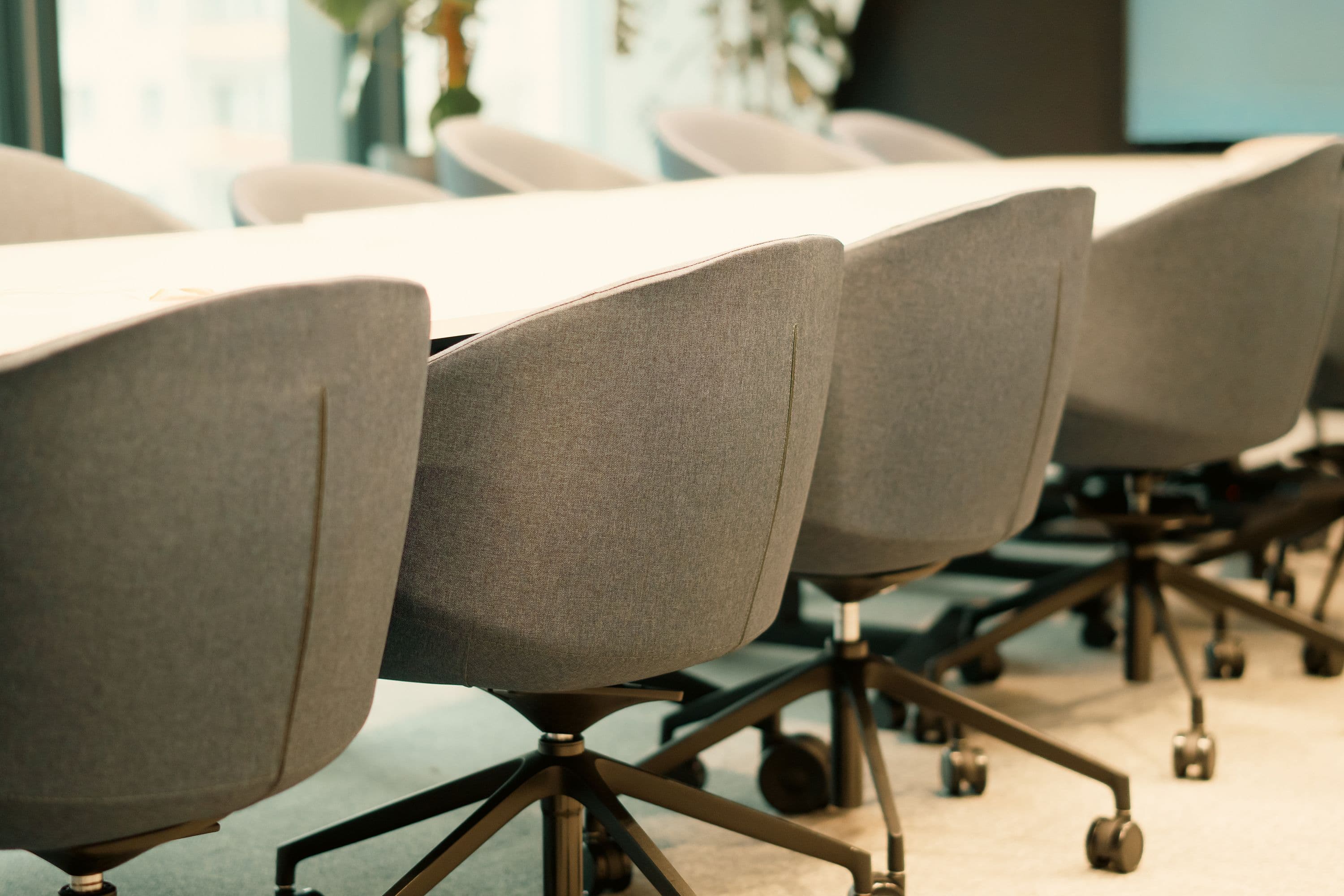 Modern task chairs around a conference table