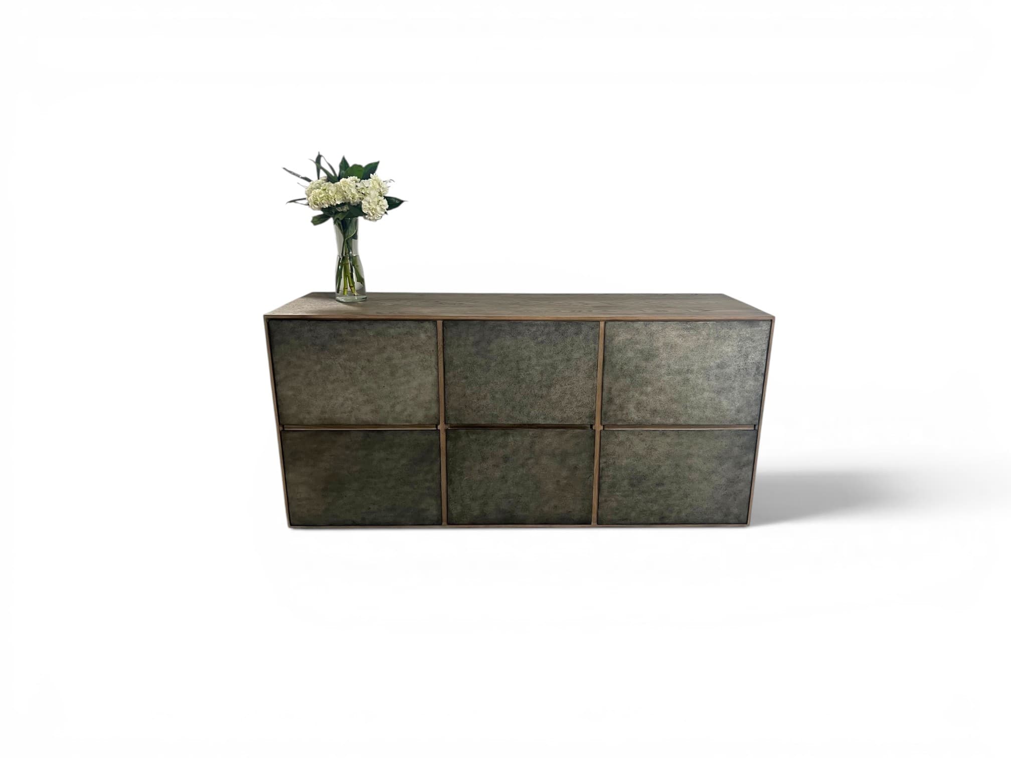 A restored vintage credenza with flowers